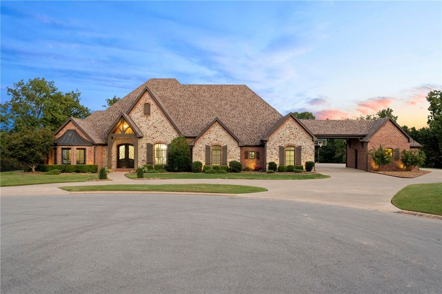 This one-owner home in the desirable Talamore neighborhood, with its lovely bridge entrance & stocked ponds is on one of the best lots in Talamore at the end of a cul-de-sac on 5 acres. This property offers privacy, expansion potential, and a glorious backyard—perfect for baseball, football, or golf. Enjoy a heated saltwater gunite pool with diving board, resurfaced in 2022 with a new heater, plus a half basketball court. The backyard backs to wooded land with no neighbors behind. Hard to find- all four bedrooms are on the main level, including a primary suite with steam shower and a guest bedroom with FEMA-rated storm shelter closet, and hand hewn wooden beams from Kansas City. The detached fourth garage bay is heated and cooled, adding an additional 433 sq. ft beyond the 4959 sq. ft of the home. A Generac generator powers half the home when needed, the HVAC serviced annually, roof/gutters new in 2020, plus RV electric hookup. Original blueprints available. Video link available or schedule your private showing.
