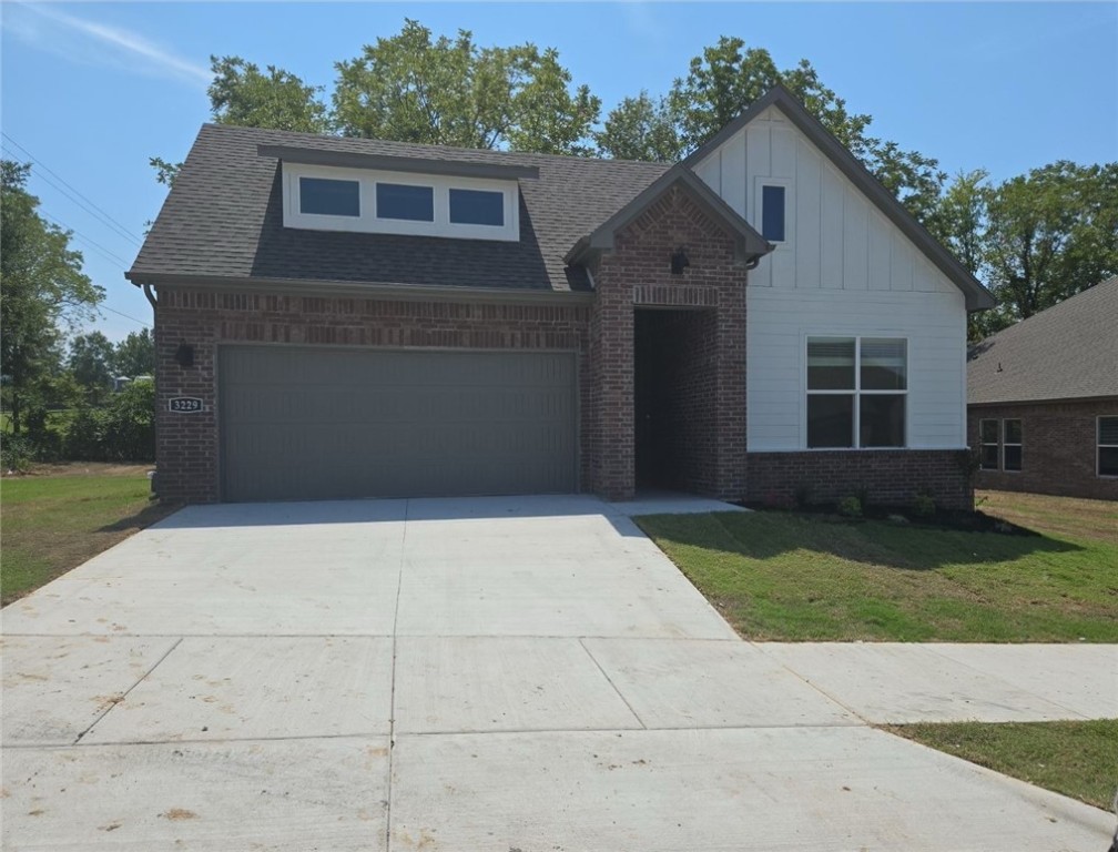 Joyful Justin Plan in Riverwalk, one of Fayetteville's most unique subdivisions that was designed for perfection. It is located in East Fayetteville, just 10 minutes from the Fayetteville Square, filled with downtown entertainment and a variety of restaurants. This subdivision includes a community pool, walking trails, and river access. Welcome to Phase V Riverwalk, centrally located to all that Northwest Arkansas has to offer. This brand-new home will have LVP throughout. Kitchen will have 42-inch cabinets, stainless steel appliances, and quartz countertops! Living room will have a beautiful gas log fireplace with painted brick surrounds and white mantle. Cased windows in the living, dining, and bedroom one. The bedroom one will have dual sinks and quartz countertops, oversized walk-in shower. High-efficiency air conditioning system with programmable Wi-Fi thermostat. Exterior of homes will be brick or Brick/ LP Smart Siding per plan. Taxes and Parcel TBD.