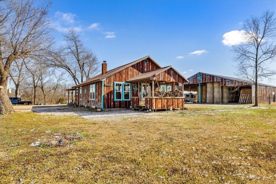 This 20-acre property is the ideal place to realize your farming dreams. It features a charming 3-bedroom house, along with numerous outbuildings and barns to protect your equipment and animals from the weather. There is also a 4-stall barn for horses, and the pasture is fenced for goats and cattle. 

The location is just minutes from Pea Ridge schools, 20 minutes from the Walmart Home Office and downtown Bentonville, and close to all the bike trails. 

To reach the property from Interstate 49, take Highway 72E for 6 miles to Mariano Road. The house will be on the right side of the road. fenced for goats and cattle  The location is just minutes from Pea Ridge schools, 20 minutes from the Walmart home office and downtown Bentonville, and close to all the bike trails.