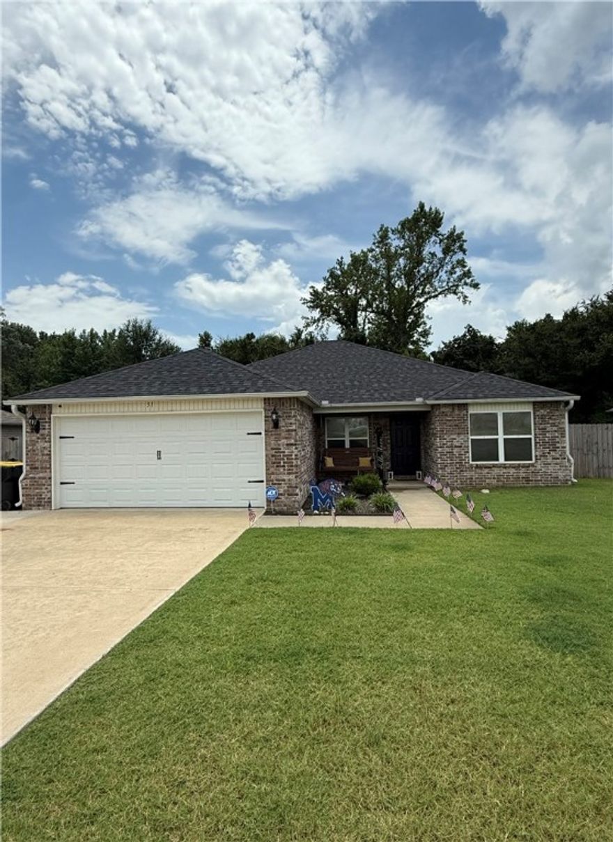 Tucked away in a beautifully maintained neighborhood in Austin, Arkansas, this charming 3-bedroom, 2-bath home is as inviting as they come. With 1680 square feet of living space, it’s been kept in immaculate condition and boasts a brand new roof, a gorgeous kitchen with stainless steel appliances a pantry, and a spacious primary suite with a large walk-in closet. The enclosed sunroom-style back porch is the perfect spot to unwind, overlooking a private, fenced backyard complete with a storage shed for all your outdoor needs. You’ll also enjoy the convenience of a double car garage and the peace of mind that comes with a full security system, including outdoor cameras and door sensors. This home is the perfect blend of comfort, beauty, and functionality—ready for you to move right in!