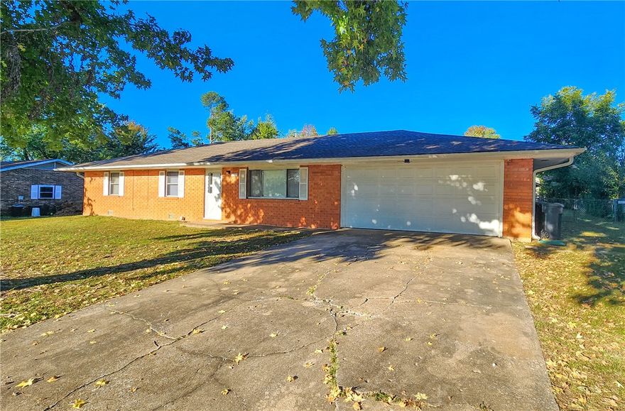 Charming 3 bedroom, 2 bath home located on a quiet street in an established Rogers neighborhood. This property offers great potential with a functional layout and just needs a little TLC to make it shine. Enjoy a spacious living area, a large screened-in back porch perfect for relaxing or entertaining, and a fenced backyard ideal for pets or gardening. Attached 2-car garage provides convenient parking and storage. Surrounded by mature trees in a peaceful setting, yet just minutes from Pinnacle Hills, Downtown Rogers, schools, and parks. Easy access to I-49 adds to the home’s convenience—an excellent opportunity to add your personal touch in a sought-after location.