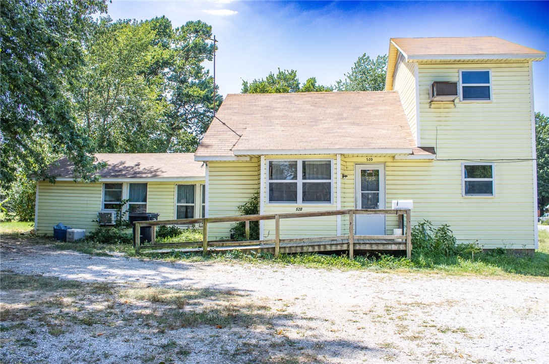 Calling all Investors! This large corner lot is walking distance to Downtown Rogers. Close to everything Rogers has to offer. Located on a quiet street. Home needs some TLC. Sold "AS-IS" no repairs.