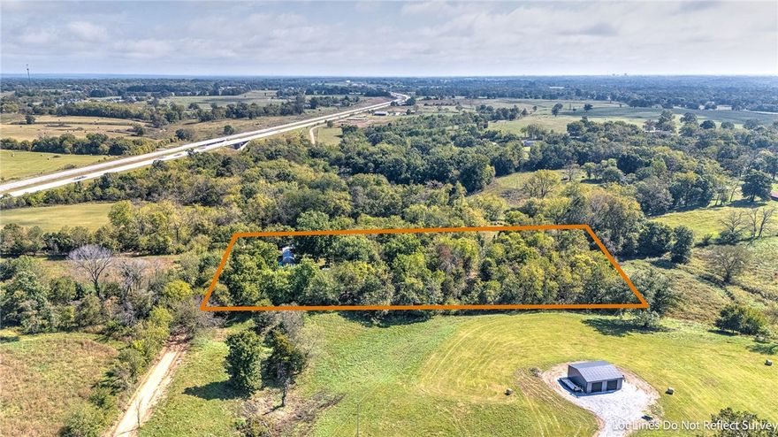 2.87 Acres Inside Gravette City Limits - Rare In-Town Acreage with Utilities & Build Potential
Welcome to your blank canvas just minutes from Gravette’s heart! This 2.87-acre parcel lies inside city limits, with electric already onsite, city water access at the road, fiber internet availability, plus an existing well & pond. The property features a 3-bed, 2-bath manufactured home (sold as-is, not on permanent foundation), a septic system likely needing replacement, and remnants of old foundations suggest multiple possible building sites. Gentle terrain, partial woodland, and open space offer flexibility for homesteads, small builds, or phased development. Located for convenience, a short drive to Gravette’s amenities (parks, trails, splash park) and easy access to regional hubs in Northwest Arkansas.