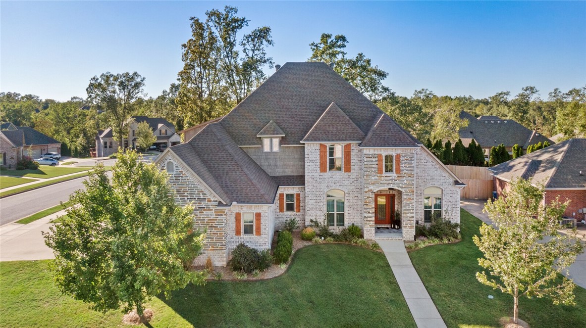 Experience luxury and comfort in this custom-built home in Oaklawn Hills. This home is north of the Square, with Boneyard trail access in the neighborhood that leads you to Crystal Bridges and Compton Gardens. Known for its peaceful ambiance and exclusivity, homes in this coveted community rarely become available.
The home features 4 large bedrooms, 3 1/2 baths, a bonus room, and a dedicated office. The open kitchen features granite countertops, 5-burner gas stove, with a new oven and microwave in 2024. Step outside into the professionally landscaped gardens perfect for hosting unforgettable gatherings or simply unwinding.
The main level master suite features a fireplace to cozy up by, a huge walk-in closet, a generous ensuite bathroom with two separate vanities and a claw-foot tub for ultimate relaxation. New roof Aug 2024, new HVAC 2023.
Experience the unparalleled comfort, style, and prestige that awaits in this exceptional Oaklawn Hills home. Let your dream of luxury become a reality!