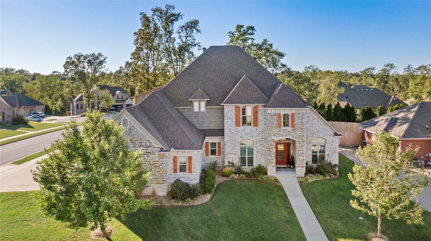 Experience luxury and comfort in this custom-built home in Oaklawn Hills.  This home is north of the Square, with Boneyard trail access in the neighborhood that leads you to Crystal Bridges and Compton Gardens.  Known for its peaceful ambiance and exclusivity, homes in this coveted community rarely become available. 
The home features 4 large bedrooms, 3 1/2 baths, a bonus room, and a dedicated office.  The open kitchen features granite countertops, 5-burner gas stove, with a new oven and microwave in 2024. Step outside into the professionally landscaped gardens perfect for hosting unforgettable gatherings or simply unwinding.
The main level master suite features a fireplace to cozy up by, a huge walk-in closet, a generous ensuite bathroom with two separate vanities and a claw-foot tub for ultimate relaxation. New roof Aug 2024, new HVAC 2023.
Experience the unparalleled comfort, style, and prestige that awaits in this exceptional Oaklawn Hills home.  Let your dream of luxury become a reality!