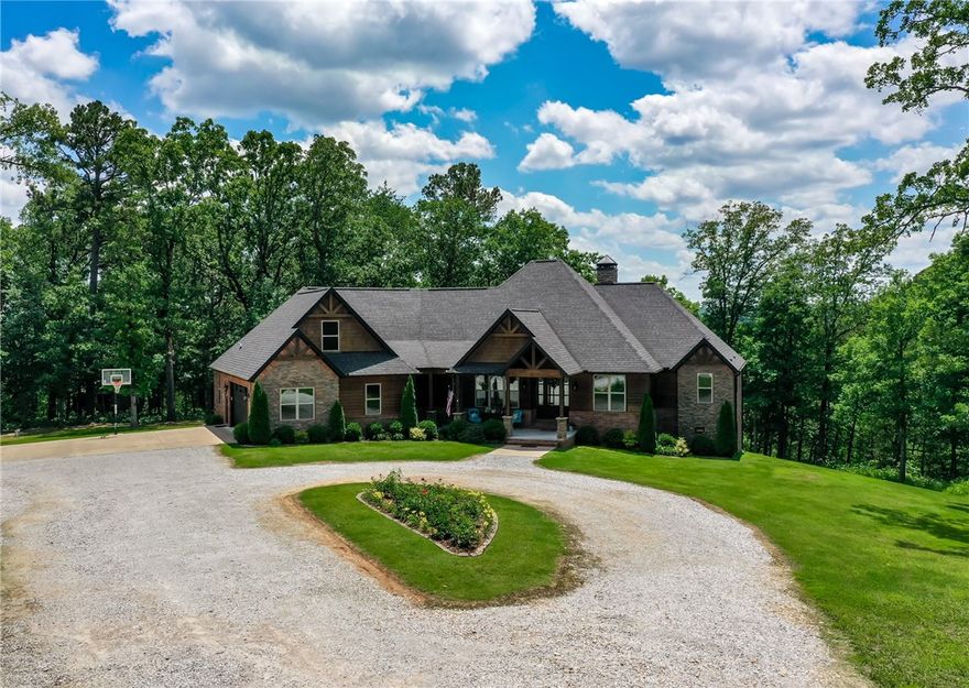 The View. Beautiful Custom Home. This 6br 4ba is 45min from anything NWA. No neighbors for 1/4 mile. The view. 22.5 secluded acres hunt hike relax over looking the Illinois River. Home is very clean well built all electric home. Each Bedroom has its own bathroom access and ceiling fan. Carbon filtered water system. Two 50 gallon hot water tanks with instant hot water recirculation. Two heat/air units, two and four ton, with different heating and cooling zones. Ozark go internet. Wood burning fire place with 44 Elite blower that heats entire home. Attic and crawlspace storage. Crawlspace is 7 ft to 3ft tall contains water heaters and filter system. Hand scraped oak floors, tile in all bathrooms, laundry and pantry. Matching granite countertops throughout entire home. Carpet with blue sky pad in bedrooms. Master Bedroom has tray ceiling with walk in closets. Master bath has walk-in shower with dual shower heads, jacuzzi tub, high counter tops. Soft close drawers on all cabinets. Generator hookup. 
THE VIEW...