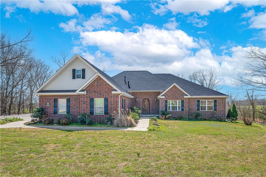 Beautifully maintained home on 2 acres in Siloam Springs offering space, comfort, and functionality! This 3-bedroom, 2.5 bath home has features 3320 sq ft and was built in 2--8 with a new roof installed a few months ago. Inside you'll find multiple living areas including a formal dining room, inviting hearth room, and a large bonus room perfect for a media room, office or play space. Abundant natural light and a 3-car garage provide plenty of storage and workspace. Enjoy the peaceful country-style living with room to spread out while still being conveniently located to town amenities.