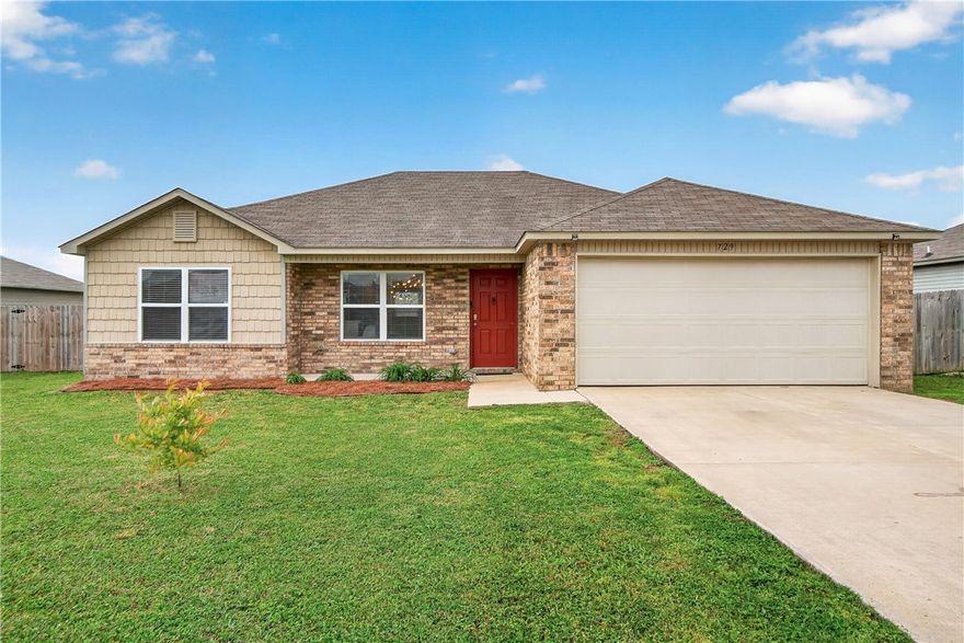 Discover a lifestyle of comfort and convenience at 729 69th AVE, Bentonville, Arkansas. Built in 2018, this inviting ranch-style single-family residence is move-in ready, offering a seamless transition to your new home. The kitchen is designed for both culinary exploration and casual gatherings, featuring matching black appliances, stone counters, and a peninsula that invites conversation and connection. Relax and unwind in the living room, where a comforting fireplace provides a focal point for cozy evenings. Each of the three bedrooms offers a private retreat, with one providing the added luxury of an ensuite bathroom for personal comfort and convenience. Beyond the interior, a private yard offers a tranquil outdoor space, perfect for enjoying the Arkansas sunshine. An attached garage provides secure parking and additional storage, while a dedicated laundry room simplifies daily routines. Step out onto the patio for al fresco dining or simply to enjoy the fresh air.
