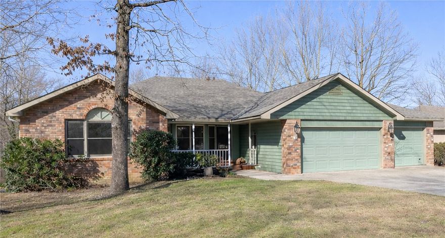 Live where the trail begins! Less than a mile to Back 40 Trail, Blowing Springs, Lakes Rayburn & Brittany-this cul-de-sac home is built for an active NWA lifestyle.  This 3bed/3ba/3car garage 1 story home features an open living room w natural light & a cozy fireplace; the adjoining office/sunroom w French doors has access to the back deck. The open kitchen is both functional & inviting, w granite countertops, stainless steel appliances, cabinetry & a sunny breakfast area w a wall of cabinets. The spacious primary suite offers a quiet retreat w access to the screened porch, a private en-suite bath, & 2 walk-in closets. Two guest bedrooms w walk-in closets are located on the opposite side of the home.  A finished walk-out basement adds flexible space for a workshop, plus more storage in the crawl space.  Outdoor living shines w a large deck & screen porch overlooking a wooded backyard. With its thoughtful layout & room to personalize w new paint, this home is ready to be enjoyed inside & out! See list of features!