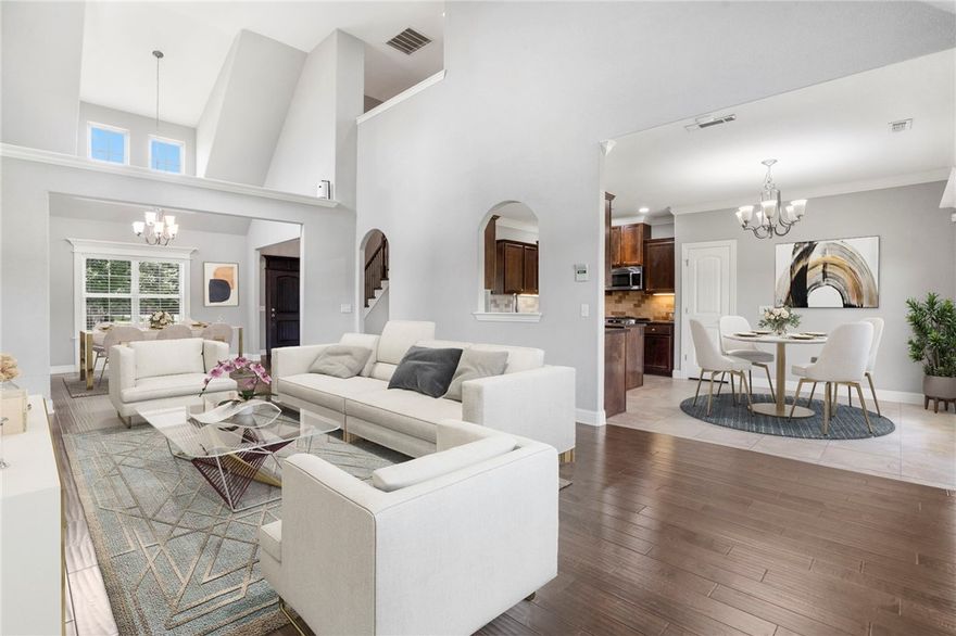 This two-level home boasts hand-scraped hardwood, crown molding, and a great floor plan for entertaining. The Owner's suite features not one but TWO walk-in closets. Enjoy the community Clubhouse and Pool or even the close Proximity to Shaw Park. Sellers are offering a home warranty with 2-10 with an acceptable offer. Whether you are a first time home buyer or looking to have more room, this would be a great move-in ready home for your family!