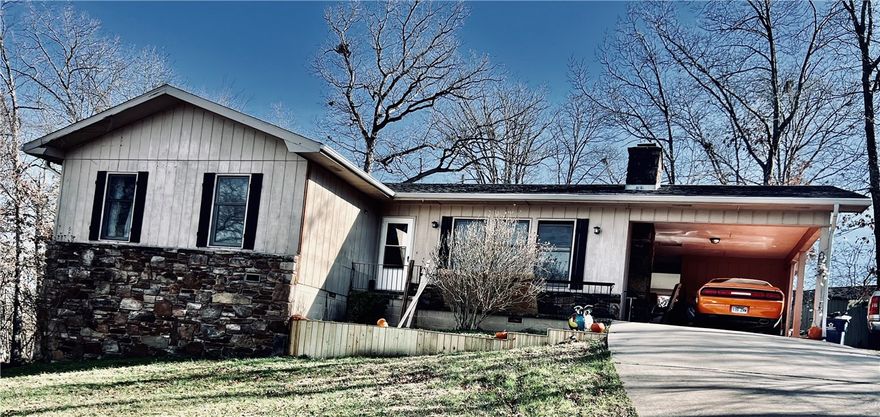 Welcome home to this charming 3-bedroom, 2-bath traditional home with fresh laminate flooring in a warm, inviting living room centered around a cozy wood-burning fireplace. In the process of completing updates. Covered back porch, Bonus spaces include a crawl space ready to be transformed into a workshop and a storage room in the carport that could become a shop or hobby area. Lots of storage. Extra parking beside the carport adds everyday convenience, making this home as practical as it is welcoming. HVAC system was installed in 2017.
