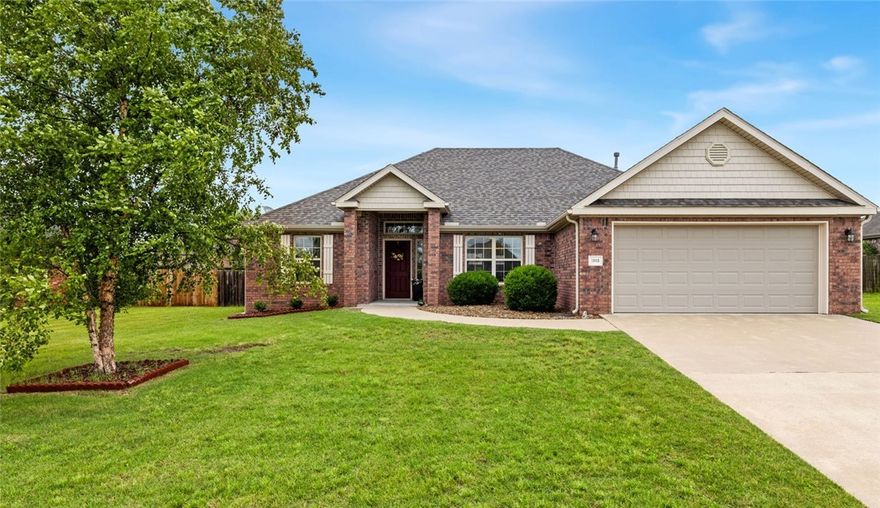 This beautifully maintained 3-bedroom, 2-bath home offers 1,800 sq ft of thoughtfully designed space with a warm, welcoming layout. High ceilings, granite countertops, and custom cabinetry add timeless charm, while the cozy gas-log fireplace makes the living room the perfect place to relax. The kitchen features an electric range and opens to a formal dining area, ideal for everyday meals or festive gatherings. Step outside to your own backyard retreat, complete with a large, covered patio, a lovely pergola, and a fully fenced yard ready for pets, play, or peaceful evenings. A quality-built storage barn provides space for tools, toys, or hobbies. Additional highlights include walk-in closets, attic storage, a two-car garage, central gas heating, and a gas water heater. The roof was replaced in 2024, giving you one less thing to think about. Located just minutes from the Walmart Home Office, schools, parks, and all the best of Bentonville, this move-in ready home is full of heart and comfort.