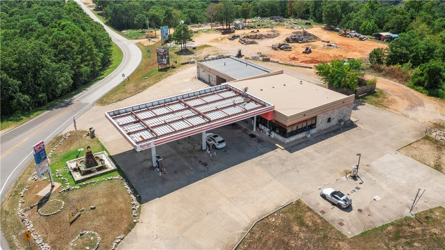 Prime commercial opportunity on busy highway 62 in Eureka Springs! This well established convenience store located on 4.03 acres, offers excellent visibility with steady traffic from both locals and tourists. The property includes retail space, all the furniture, fixtures, equipment, storage, ample parking, making it ideal for continued operation or a new business venture. Pumps include 4 gas and 1 diesel. All in good operating condition. All the testings required are up to date and inspected by ADEQ. Main station is 3700 sq.ft. with an additional structure providing 2232 sq.ft. which is currently a 2-bay non-functioning car wash and storage. Beaver lake and White river is 10 mins and 5 mins from Opera in the Ozarks. Located just minutes from downtown, this location provides strong potential for growth. Don't miss your chance to own a turnkey business in a high-demand area!