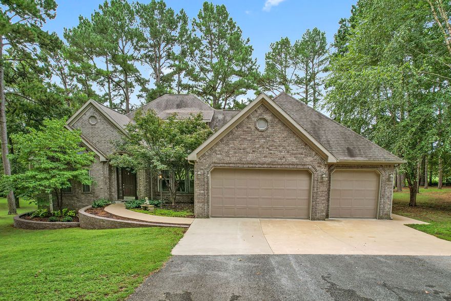 Amazing , like no other, one owner custom home within a wooded sanctuary, a three car garage w/ three buildings on Fayetteville’s Wyman Road on over 2 acres, this expansive 2,900 sq ft custom home is perfect for multi-generational living. With two primary suites and a third bedroom, plus an open floor plan connecting the gourmet kitchen and living area with optional formal dining room/office. The large sun-room provides additional area to relax and enjoy nature. A second building with a spacious 2,100 sq ft insulated/wired shop, built with the same high-quality materials, offers endless possibilities—convert into a guest suite, studio, or workshop. It also includes three-car garage for a total of 6 car garage spaces in total on site. Additionally, a third detached insulated/wired, 250 sq ft cottage-shed offering ample storage. Great space for extended family, a home office, or studio/shop, this home adapts to fit contemporary living. Town and Country living within minutes from the University of Arkansas.