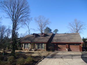 Unique- Quality - Beauty- All describe this 2,500+ sq. ft. Home. Almost everything in home is new, and the best quality money can buy. 3 Bedroom, 2 1/2 Bath, Fireplace, Raised garden beds, storm shelter, generator,various out buildings. Screened in Porch, and many, many more features. All located on approx. 3.34 acres just outside of town.