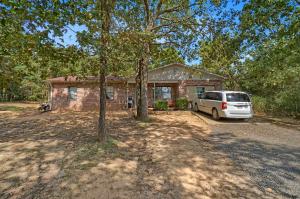 If you are looking for a little privacy, but still close to town, look no further! Come check out this 1400 square feet home sitting on an acre lot. Offering 3 bedrooms, 1.5 bathrooms and a 4th bedroom or second living area option. There is new flooring through out and lots of counter top space in the kitchen and a large laundry room. The land has had all the work done to create a nice back yard, just plant the grass seed and your done. The roof and HVAC are under 5 years old.