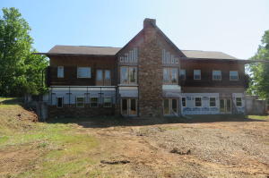 Finish out this house and it will become a showroom style home . This home boast of 3681 sf upstairs and 3600 sf of basement area. (per tax records) Sitting on 14.37 ac M/L in a highly desired area.