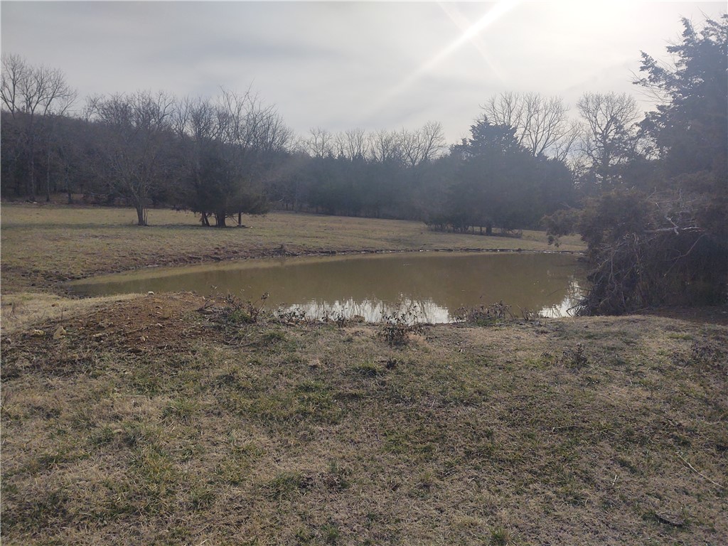 Chance in a lifetime to own property adjacent to the Pea Ridge Military Park. Dreams of being in the country? Here is your 4+/- acres to do it. Very quite area with paved road and high speed internet at street. Pea Ridge school district and only 5 minutes to town. Views of the Pea Ridge Military Park. Miles of walking and biking trails on pavement or off. Also horse riding trails through the park as well. Many building locations to choose from. Rural water and electric available at the street. This is the location for your private estate. Gravel drive to be installed for access off of Gann Ridge Rd. No mobile homes will be allowed. Buy 1 lot or all 3 lots. Taxes will change due to lot split. Lot is behind 14575 Gann Ridge Rd. 3 more lots are listed separately. Map location is incorrect on Zillow.