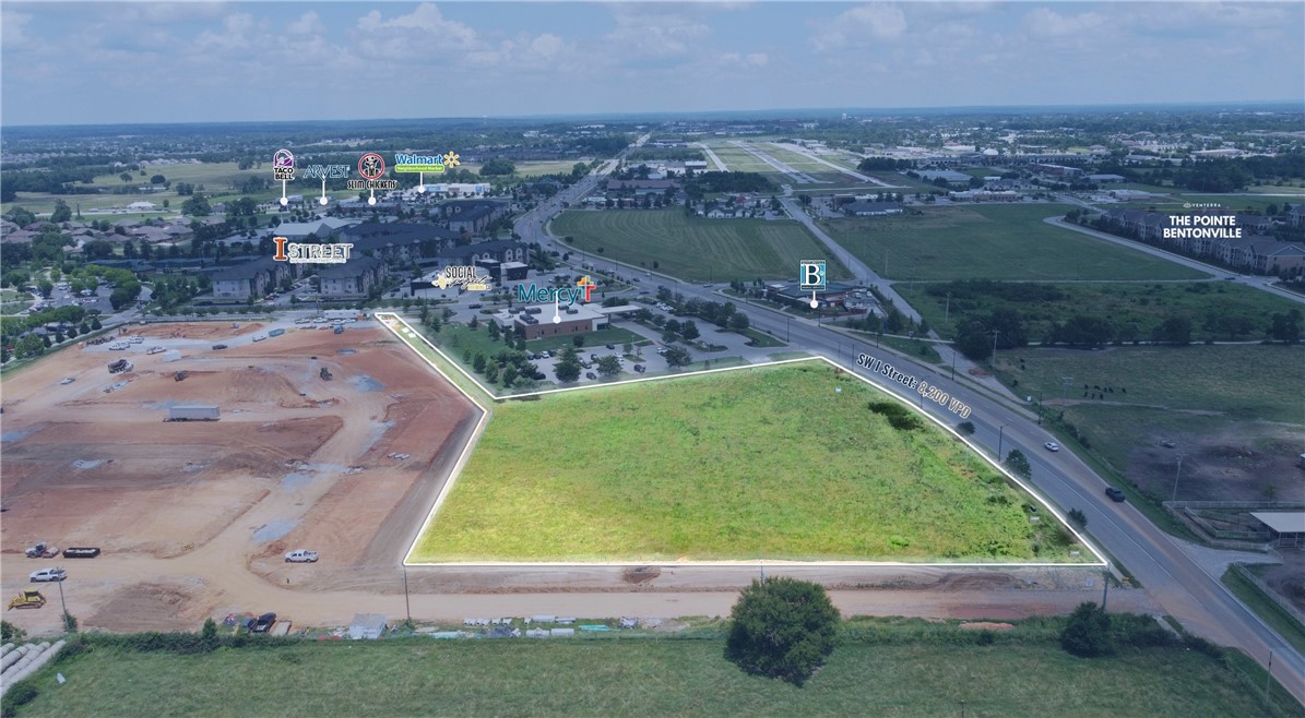 Sale overview
Available: 2.00–4.25 acres.
Asking price: $1,943,856.
Zoning: MF-16.
(Parcel can be split for minimum 2.00 acres.)
Site highlights
This 2.00–4.25-acre multifamily development opportunity offers 626 feet of frontage on I Street and sits adjacent to the Bentonville Community Center and the new 160-unit McAuley Place housing development. The lot can be split with a 2-acre minimum. The property is located in a rapidly growing area with strong demographics, just 2 miles from I-49 (82,000 VPD) and 9 miles from XNA Airport. Surrounded by new development, city parks, and retail, it also provides convenient access to downtown Bentonville and the Pinnacle area of Rogers.