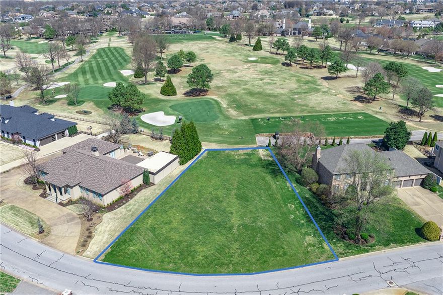 Welcome to a golfer's paradise! Lot 38 is the last available golf-front homesite in Pinnacle. Wake each morning to sweeping views across Pinnacle Country Club's championship course. Lot 38 Champions Blvd is an extremely rare, completely level 0.41-acre parcel sitting directly on the golf course, home of the LPGA NW Arkansas Championship. Tucked behind the gates of one of Northwest Arkansas's most coveted addresses, you're just minutes from the Pinnacle Hills shopping, dining, and entertainment corridor. All utilities — electric, gas, public water and sewer — are at the street, making this truly shovel-ready. Your dream home begins here.