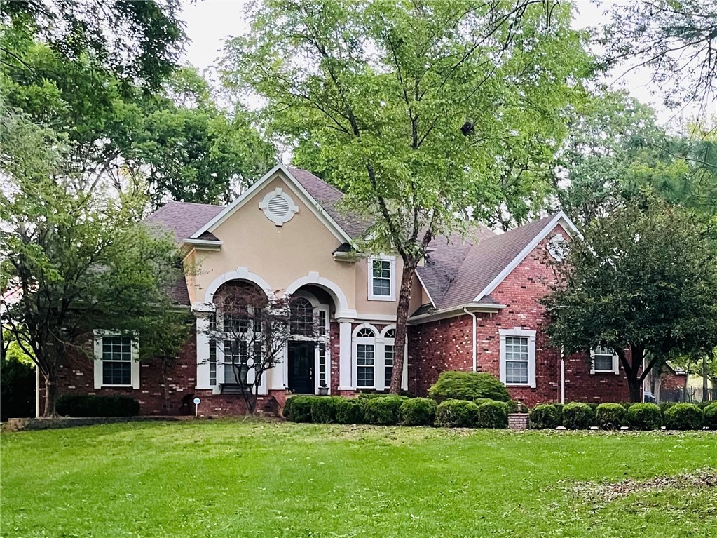 Elegant 4-bd, 4-bath residence offering 4,200 +/-?sq? ft of refined living space on a beautifully landscaped 0.98-acre lot. Custom built w/ prem features & updates, this home is located in a coveted subdiv in Siloam Springs, within walking distance to JBU, Bob Henry Park, & downtown. Every detail has been thoughtfully updated for modern comfort while preserving timeless style. Highlights incl: Grand 2-story foyer; *Bright, open concept living & dining areas w/ fresh interior paint & refinished hardwoods; *Gourmet kitchen feat natural-finish hardwood floors, walk-in pantry, & spacious island; *Primary suite on main level w/ spa-inspired bathroom incl a steam shower;*Flex layout w/ double Primary bedrooms or Primary w/ adjoining nursery for versatility; 3 generously sized secondary bdrms upstairs; Billiards room & a home theater or fitness room!-Step outside to an expansive backyard-an entertainer’s paradise w/ custom fire pit in a park-like setting, mature shade trees, & plenty of space for a future pool or garden.