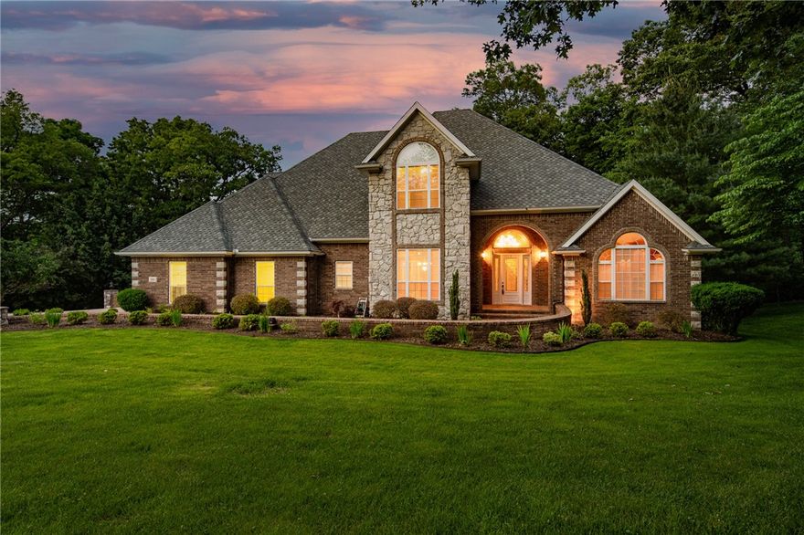 BUILDER’S HOME in premier location, this 6 bedroom, 5.5 baths has TWO 3-car garages.  A fantastic home stands out like an estate home on 1.07 acre lot in the heart of Bentonville.  The main level features a spacious foyer, formal  living and dining rooms, large  living room, eat-in kitchen, master suite, office and utility room.  Upstairs you will find a second master with spacious sitting area and 3 additional bedrooms.  Each bedroom has private access to a bathroom.  The basement area has a large family room with game area and wet bar plus bedroom #6 or exercise room.  The home boasts 3 gas log fireplaces, elegant crown moldings, hardwood, granite,  new roof in 2020, both hot water tanks replaced in 2021.  You can’t find a better location close to downtown Bentonville and still enjoy your privacy.