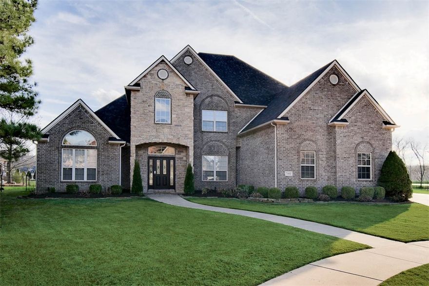 Introducing 7402 W. Osage Valley Court where “location, location, location” means something.  Nestled in one of the Most Sought After Cul-de-Sacs in the Prestigious, Gated Shadow Valley Golf & Tennis Country Club Community, this Beautifully Timeless, Golf Front Home will Rise to Meet you Daily & Cradle You in Creature Comforts of Every Kind. Gracious Living Meets the Warm Embrace of All-Things Home in this 4,459 square foot Traditional Floor Plan which includes 5 Bedrooms, 3 ½ baths, an Expansive Gourmet Kitchen, Dedicated Office, Formal Dining Room, 2 Living Spaces, Dream-sized Bonus Room, Inviting Primary Bedroom Suite w/Built-in Fireplace, Plenty of Storage & a 3-Car, Sideload Garage.  Offering Front-Row Seats to Gorgeous Sunsets & Lushly Lavish Landscapes, you will Never Tire of Your Very Own Curated Display of Nature’s Ever-Changing, Artistic Expression. Embrace this Tennis Membership Level, Relaxing Retreat on the 17th hole & just Steps Away from one of the Neighborhood’s Best Parks. Welcome Home!