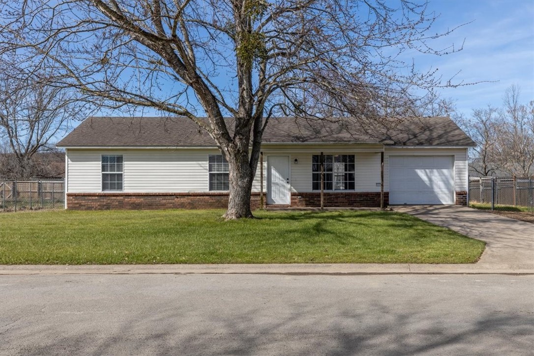 Nice, well-maintained 3BR-2BA home in Elkins. Move-in ready! Catherdal ceiling in living room. Primary bedroom with walk-in closet. Luxury vinyl plank flooring in the living room and hallway. Half of the garage has been converted to a bonus room / office space. The remaining garage has a garage door opener and is suitable for a motorcycle, lawn mover, Smart car, etc. The backyard is fully chain-link fenced for your furry family member to roam. Truly a great place to call home!