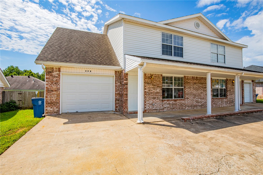 Great Location in Bentonville just minutes from Biking trails !!! This cute 3 bedroom 2 and 1/2 bath duplex, with one car garage includes refrigerator, fresh paint. New vinyl plank flooring in living room and dining area, patio and on main level and deck off master bedroom. Fenced yard.