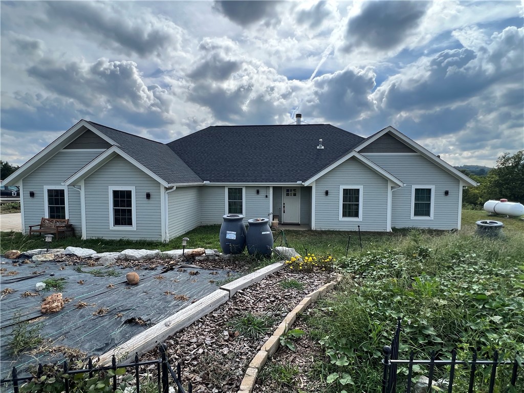 Great Ozark Mountain homesteaders mini farm. Come check out this 5 BR, 3.5 BA, 2,141 SQFT, 2 car garage, and 6.71 acres m/l. The home features granite countertops, wood fireplace, wood stove location, walk-in closet, pantry, and much more. The land is all in fenced pasture for livestock and has a 30ā x 40ā metal shop with concrete floor and electric. Call today to schedule a showing.