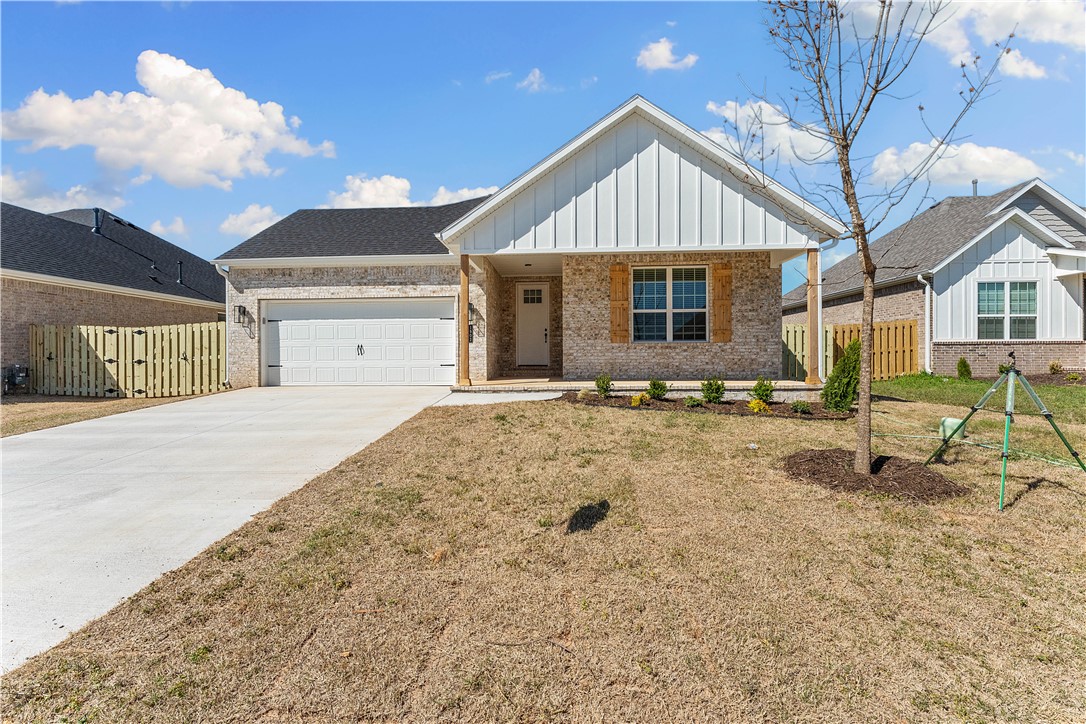 Pea Ridge welcomes you to its rapidly growing community. The Yorktown subdivision places you at the heart of it all, offering close proximity to schools, parks, and beautiful scenic views.This lot showcases the Cardinal Plan, where you're welcomed by LVP flooring and bright, airy touches that bring the home to life. All bedrooms are conveniently located on one side of the house, with two bedrooms and a bathroom at the front, while the primary suite is tucked at the back, next to the laundry room and two extra storage spaces. The kitchen, living, and dining areas flow seamlessly together, with the kitchen offering ample storage, including a walk-in shelved pantry. Enjoy outdoor living with both covered front and back patios.For a limited time rates starting at 4.99% OR $7,500 from builder & up to $4K from preferred lender. For access to see all the homes stop by the model home at 1602 Christman St. Open Monday, Tuesday,Thursday, and Friday from 10-4 and Sunday 1-4.