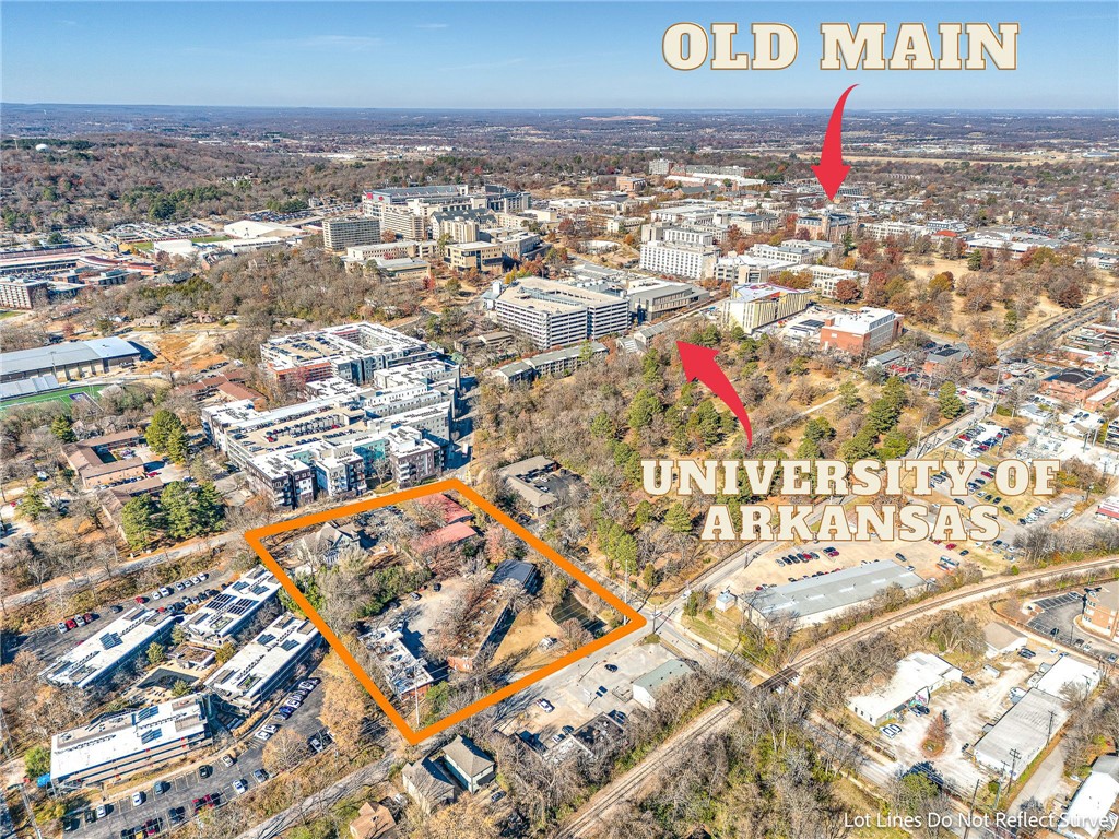 Attention student housing developers: Seize a rare opportunity to construct student housing within walking distance of the University of Arkansas. Perfectly positioned just 0.2 miles from the campus, 0.25 miles from Dickson Street, and a mere 0.5 miles from the Fayetteville Square, this offering is a strategic investment. This parcel totals .67 acres and is zoned as Downtown General. This zoning presents a unique chance to maximize unit density and optimize income potential in a high-demand area. Don't miss out on this exceptional development prospect in one of the most coveted locations near the University of Arkansas. Also available as part of a package containing 2 adjoining parcels