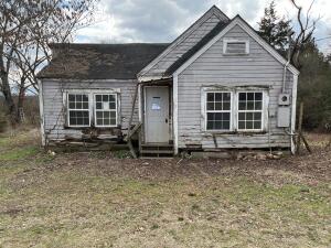 2 bed 1 bath home on .55 acres. Repair and reap the benefits of this home that is only 5 miles from Clarksville. Property will sell as-is.