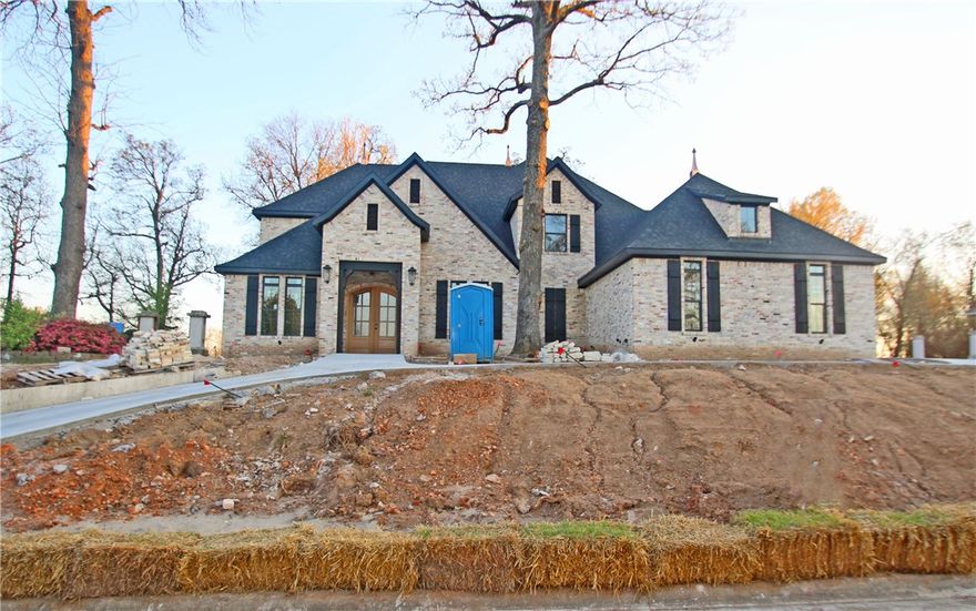 Customize your dream home in the prestigious Pinnacle Country Club! This 4,560 SQ FT new construction features 5 bedrooms, 3.5 baths, office, media room and bonus room. Open floor plan w/gourmet kitchen offering Thermador professional grade appliances and Shaker style cabinets. Vaulted ceilings in media room w/kitchenette. Custom audio package, abundant built-ins, large circle drive, outdoor fireplace, security system. Grand master bath with free standing soaker tub & large custom shower w/2 shower heads.