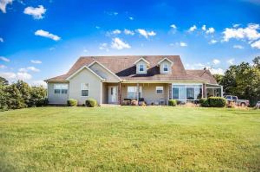 Beautiful FOREVER home with 40 acres! This home has it all, beautiful Ozark Mountain views, 5 bedrooms 3 bathrooms, full walk out basement, sunroom, extra living space HUGE Master bedroom and bathroom with a walk in closet and the list goes on! Beautiful large yard, surrounded by trees and views. Call to schedule your private tour of this home today!