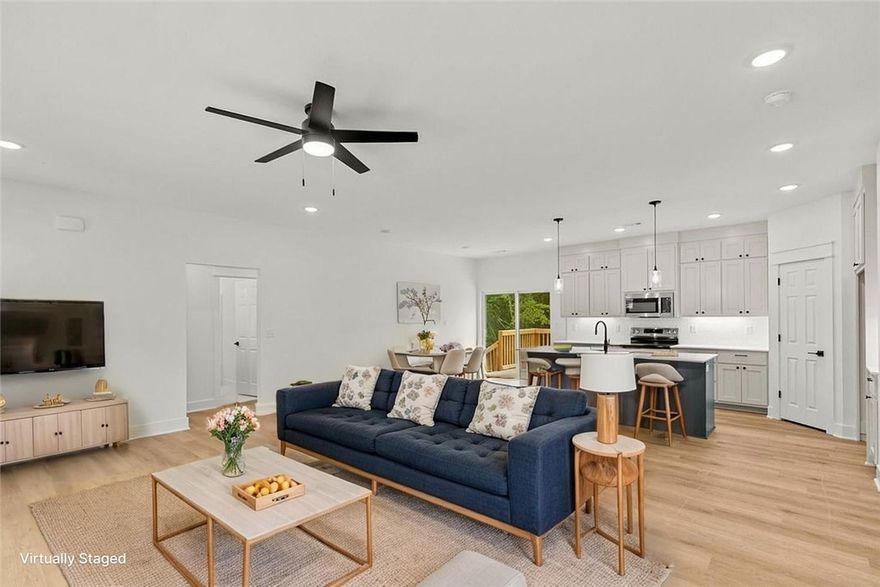 This stunning new construction home in Bella Vista offers 1,640 square feet with three bedrooms and two full bathrooms. The eat-in kitchen features elegant quartz countertops, while luxury vinyl plank flooring and energy-efficient LED lighting create a warm atmosphere throughout. The master suite includes a generous walk-in closet, and additional bedrooms provide flexible living space. Step outside to your private deck surrounded by mature trees for natural shade and privacy. Located in desirable Bella Vista with access to exceptional community amenities, this home combines modern finishes with the peace of mind of new construction.
