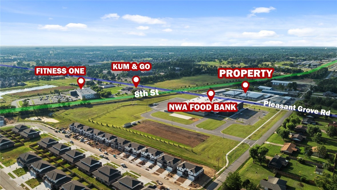 Rare opportunity to own a self-storage facility in the rapidly growing region of Northwest Arkansas. Built in 2022, this modern facility features predominantly climate-controlled units, which command higher rental rates compared to non-climate options. Situated on approx. 3.46 acres, the property is fully gated, equipped with security cameras, and includes an on-site office with a restroom for added convenience. The facility boasts durable concrete driveways throughout. Located at the high-traffic intersection of 8th St (24,000 VPD) and W Pleasant Grove Rd (10,000 VPD), the site offers excellent visibility and accessibility. Positioned directly across from the Northwest Arkansas Food Bank, this property benefits from a prime location in a thriving and high-demand demographic area.