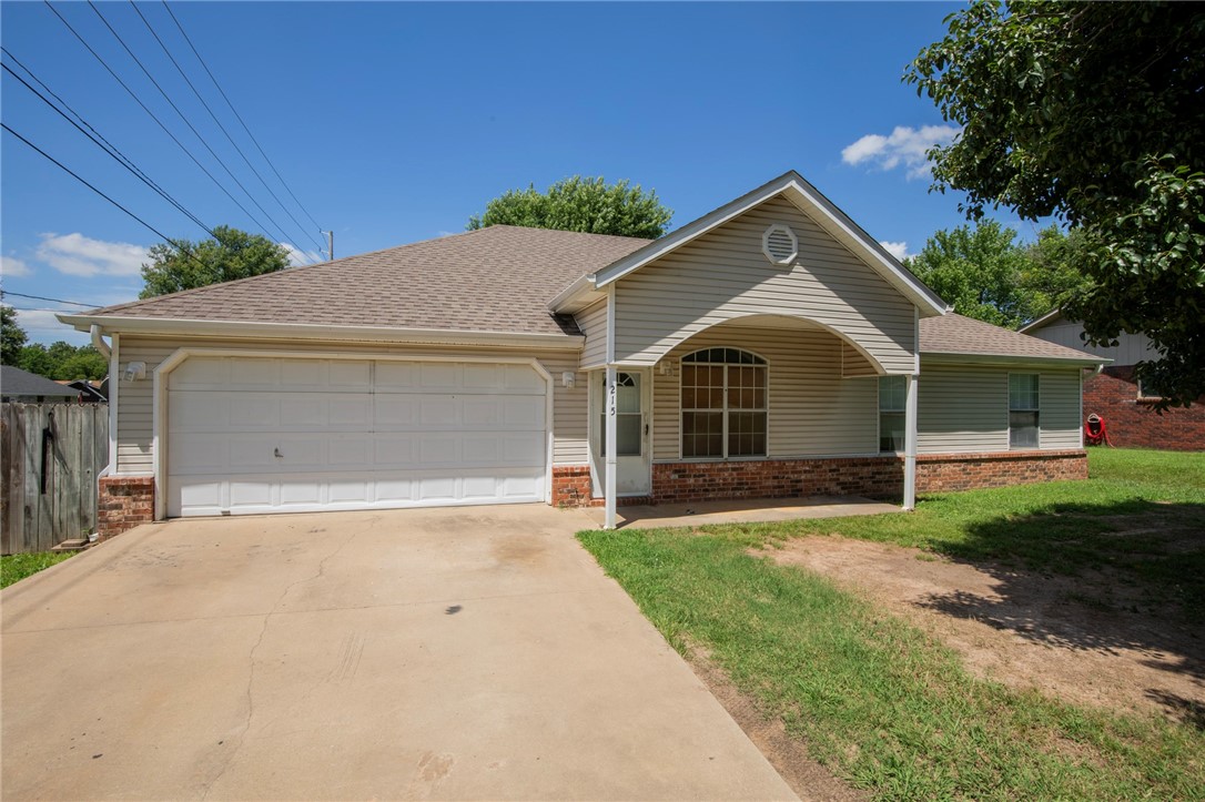 This well-maintained property has had several updates for added comfort and convenience. All flooring, except for the tile, has been replaced with modern laminate. The interior drywall has been repaired, and the water heater was replaced immediately after purchase. The backyard deck has been expanded by the tenant, creating additional outdoor living space. A new dishwasher was also installed in 2022. Sold as is. Located within the sought-after Farmington School District, this home is just a short drive from all the amenities and attractions Fayetteville has to offer.
