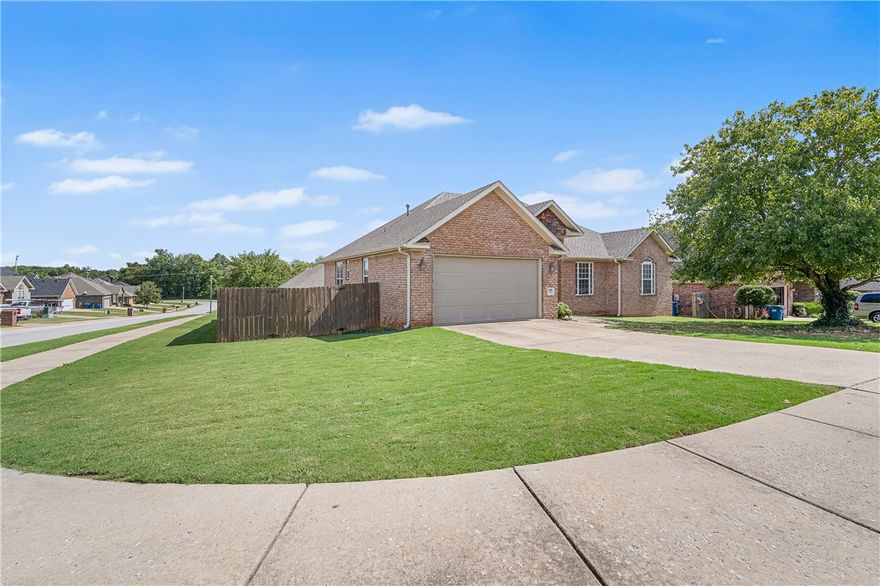 Welcome home to this full brick charmer in Eagle Creek subdivision in Bentonville. Spacious, 3 bed, 2 bath home with dedicated laundry room, eat-in kitchen and separate office. Living area features wood mantle and gas-log fireplace. Lots of space in the kitchen with movable, granite covered island, pantry and extra cabinets. Dining area has wood floors and tray ceiling. Laundry room has added storage and a utility sink. Primary suite has walk-in closet and access to the deck plus ensuite bath with dual vanities, shower and walk-in tub. Two other bedrooms bathed in natural light. Enjoy relaxing on the large, covered deck. Convenient location on a corner lot with large yard. New roof and HVAC.