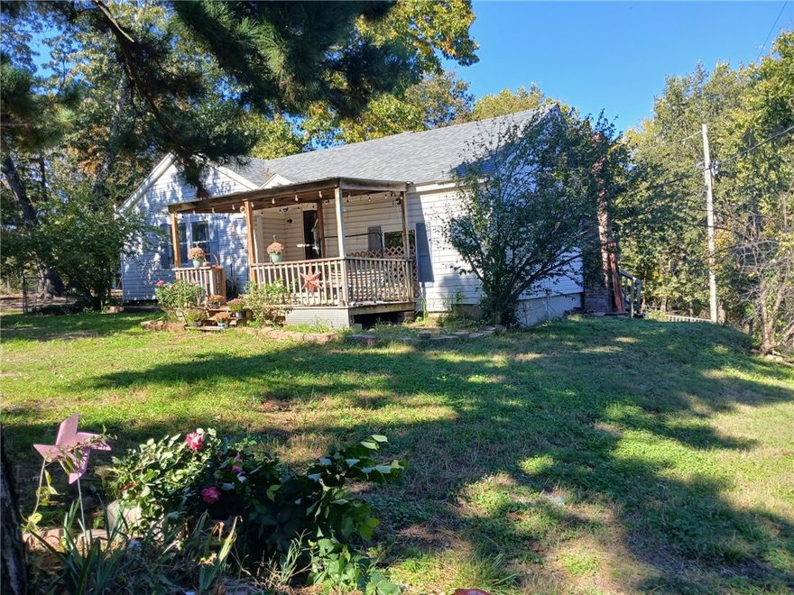 Come take a look at this cute hobby farm. Home is a 3-bedroom plus bonus room or 4th bedroom. Approx 10 minutes from the new WOKA park and bike trails; yet still close to Siloam amenities. New central heat/air unit in 2024. New roof in 2023. Pressure tank less than 5 years old. Several outbuildings, chicken coops, and trailer home stay.