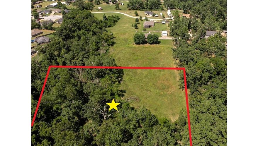 Build your dream home on this beautiful 3.48-acre lot in Rogers offering the perfect balance of space, privacy, and convenience. This buildable property provides plenty of room for a custom home, shop, or outdoor living spaces while still being just minutes from everyday amenities. Located near local schools, downtown Rogers, and Beaver Lake, you'll enjoy easy access to shopping, dining, recreation, and outdoor activities. The gently rolling acreage offers a peaceful setting with the flexibility to create the property you've been envisioning. Whether you're looking for a private homesite or land with room to spread out, this property offers endless potential in a highly desirable Northwest Arkansas location. Rare opportunity to own acreage close to town while still enjoying the natural beauty and lifestyle that Rogers and the surrounding area have to offer.