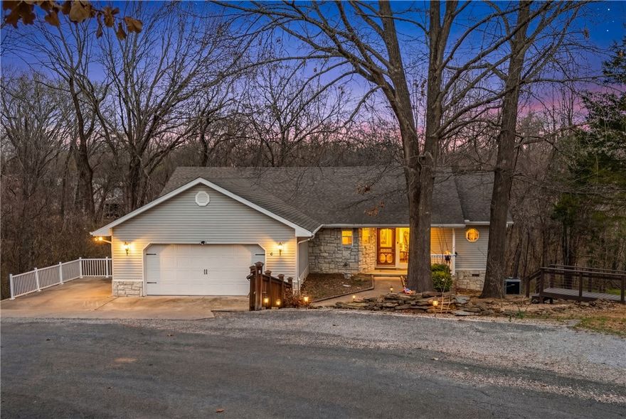 A decorative pond welcomes you to this well maintained Bella Vista home with flexible living options and income potential. The 1460 sq ft main level offers 2 spacious bedrooms and 2 full baths, with a bright sunroom that opens to a newly painted deck for relaxing or entertaining. New roof in 2019. 

Downstairs, the fully finished basement has its own heating and cooling, w/ easy interior and exterior access. Includes a mini kitchen, dining area, living room, bedroom, and full bath. A second freshly painted covered deck leads to its own designated parking, ideal for guests or tenants with minimal disruption to Main Level. 

Located within minutes of Bella Vista's 7 private lakes, golf courses, and Oz Trails Bike Park opening in 2026. Potential for multi-generational or short term rental use. Two adjacent vacant lots are also available Lot 9 (MLS 1339366) and Lot 11 MLS #1339367). Purchasing all 3 properties would provide a buffer on all sides of the home. Open Sat 3/28 1-3.