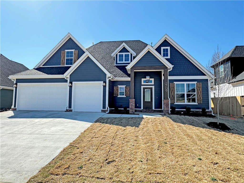 New construction home in desirable area in SW Rogers! It features 4 BR plus bonus room/3.5 baths/3 car garage. Downstairs has open concept in the living and kitchen area. Kitchen is equipped with gas cook top, built-in oven and microwave, large island, pantry, and eat-in dining. Primary is on main level with a spacious bath and closet. Upstairs has bedrooms 2-4, 2 full baths, and/or bonus room.