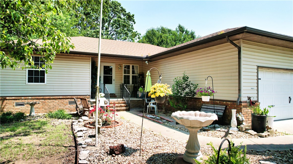 Charming Country Retreat with Spacious Shop in Garfield on +/-3.99 acres! Escape to peaceful country living with this well-maintained 2-bedroom, 2-bath home nestled on a scenic rural lot in Garfield. Offering 1,435 square feet of comfortable living space, this property combines modern convenience with the serenity of nature. Step inside to find a bright and open floor plan, featuring a spacious living area, a functional kitchen with ample storage, and two generously sized bedroomsāeach with its own full bathroom, ideal for privacy and comfort. Outside, you'll love the expansive 30' x 50' shop buildingāperfect for hobbies, a home-based business, storage, or all your recreational toys. The surrounding landscape offers room to roam, garden, or simply enjoy the quiet countryside. Storm shelter in garage.
Located just minutes from Beaver Lake and a short drive to Rogers or Eureka Springs, this property is perfect for those seeking a blend of rural charm and convenient access to Northwest Arkansas amenities.