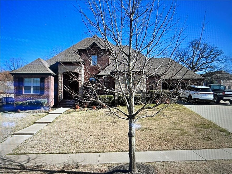 Elegant home in Stone Mountain Subdivision features a well laid out open floor plan, perfect for entertaining and day to day family life. Wood floors and a floor-to-ceiling rock fireplace create a coziness to the living room as the full wall of windows brings in an abundance of natural light. Fenced backyard, split floor plan, large kitchen.