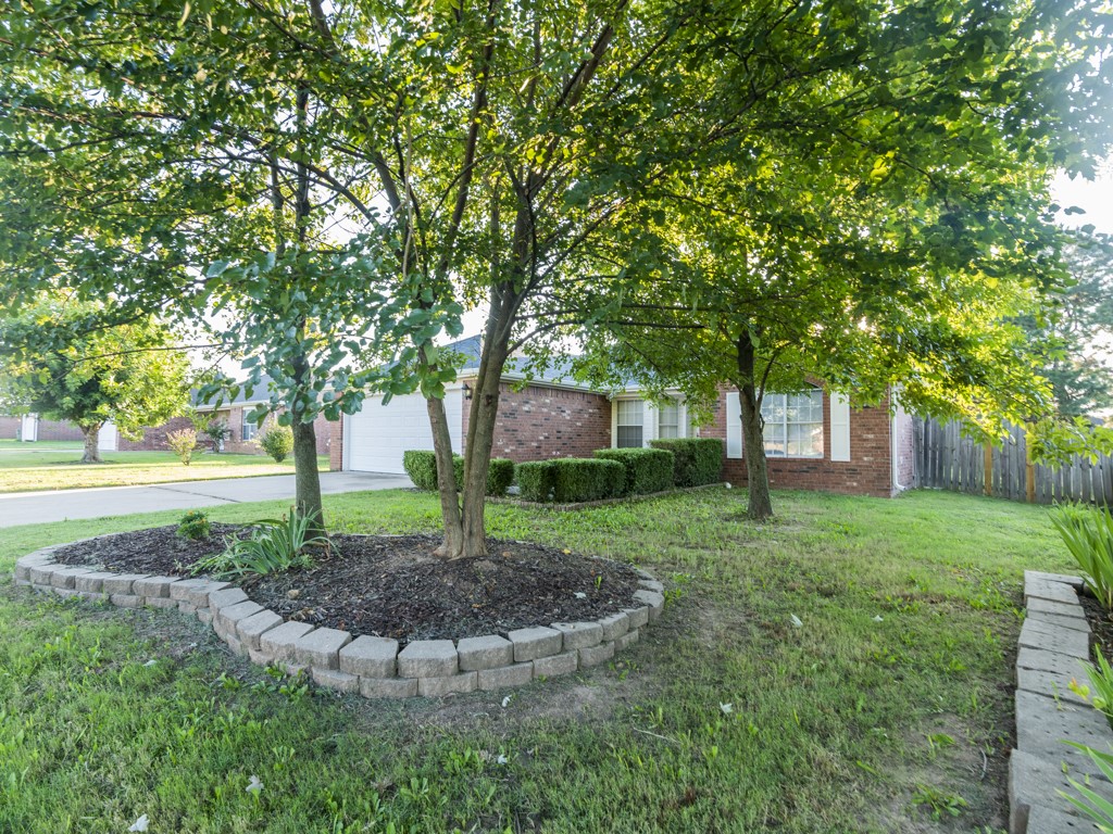 Centrally located in the heart of Centerton. This solid brick home consists of a new roof with transferable warranty, new gutters & downspouts. Granite countertops, new interior paint throughout. Split floor plan, large privacy fenced yard has a nice patio area. One of the few homes where you can enjoy the beautiful mature trees. Professionally landscaped.