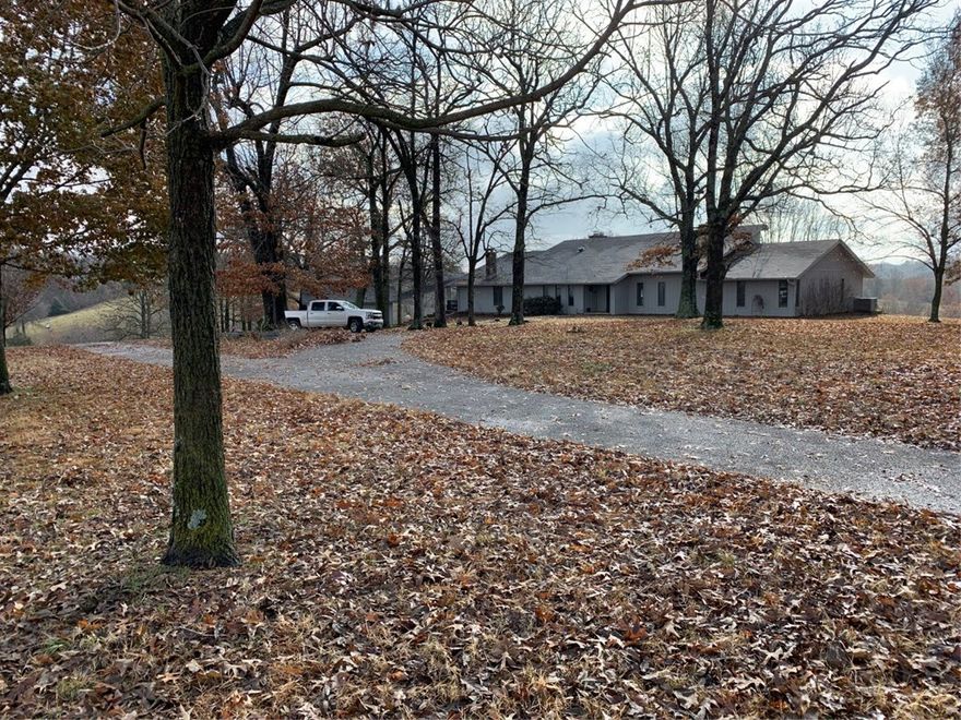 413 acre cattle & horse farm with beautiful views. Big 7,800 SF home with 4 bedrooms, 4 baths & an indoor swimming pool. Upgrades include: Steel siding on house & garage (2005), added sunroom (2005), two A/C units replaced (2018), owner spent $85,000 for upgrades in 2018. 1,000 gallon water storage tank, 2 hay barns, cattle work pens, 9 pastures, 2 barns, cattle guard & so much more! No mobile homes, no chicken houses & no hog houses. Call for more info.