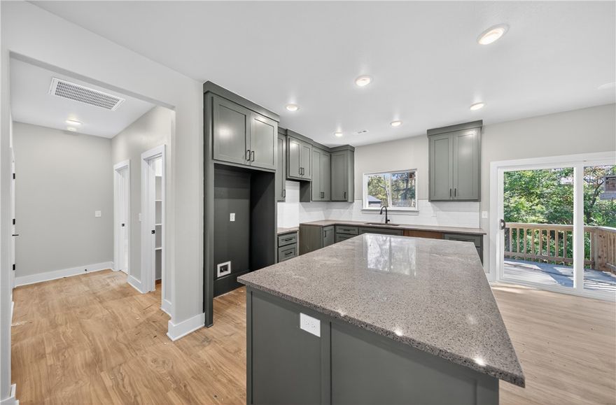 Welcome To Your Next Home! This Bella Vista Beauty Is Fresh, Sharp, And Ready To Impress. Three Bedrooms, Three Baths, And A Layout That Actually Makes Sense. The Living Room Is Wide Open And Ready For Whatever Vibe You’re Feeling. Custom Cabinets? Yep. Thick 3CM Granite? Obviously. That Primary Shower? Straight-Up Gorgeous. The Split Floor Plan Keeps It Cool, And The Back Deck? Perfect For Sippin’, Chillin’, Or Grillin’. All This Just Minutes From I-49, Highlands Golf, And Lake Loch Lomond. This One’s Got The Look and The Location.