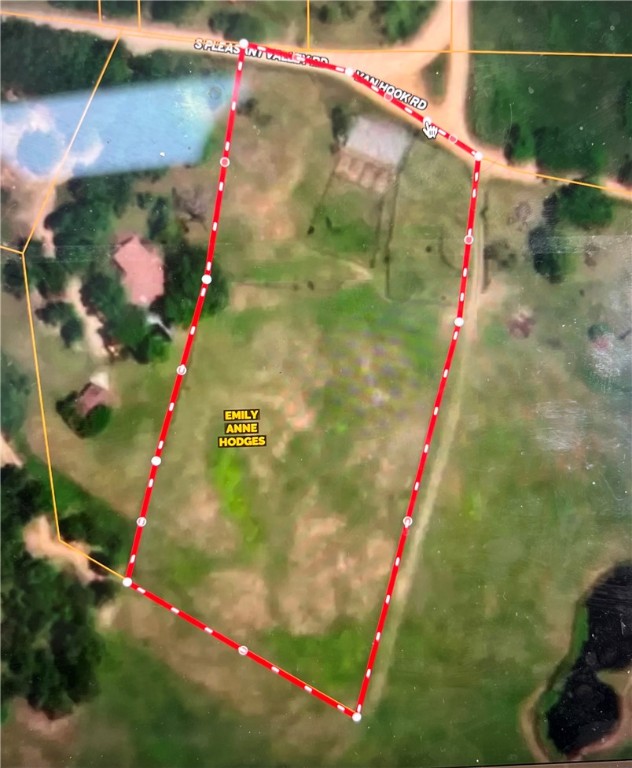 4.2 ACRES + BARN. Mostly level, completely fenced cattle farm land. 30'x50' barn with concrete runway thru barn with electricity. Needs septic and well (plumbing is in place from previous well). Barn only, nearby home is not included in this offering. Very desirable location 20 minutes from everything NWA.
Live onsite - retrofit the barn with living quarters, "the barndo lifestyle." Small organic farms are gaining profitability and popularity each year. Back to the landers - here's an affordable and practical amount of land to get out the big city. Home schoolers - safe, room to roam, create, grow, and be a kid.