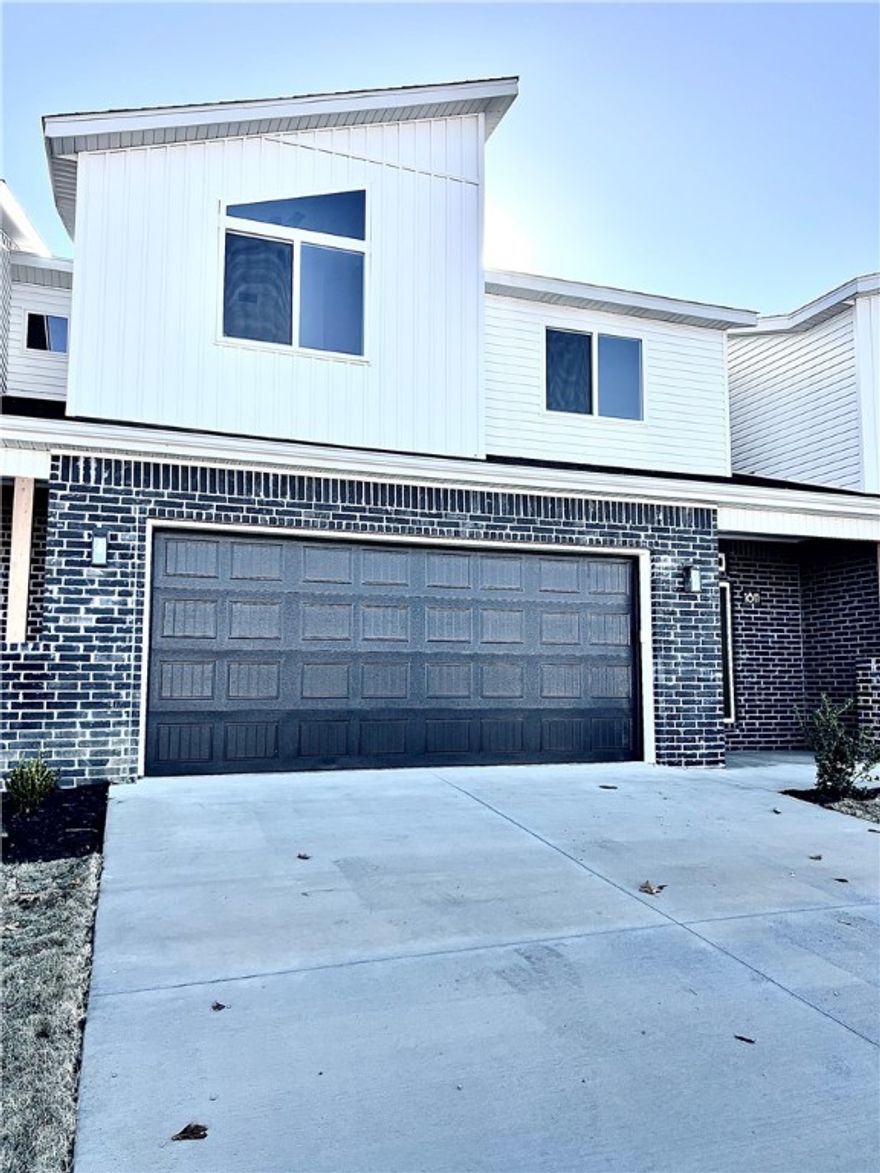 New construction Town-home offering 4 bedrooms, 3 full baths, and 1 half bath. This property features a private wood-fenced backyard, quartz countertops in the kitchen, a large pantry, and stainless-steel refrigerator. Washer and dryer are included! The primary suite is located on the main floor. Luxury vinyl flooring throughout the downstairs and upgraded carpet upstairs provide comfort and durability. Three additional bedrooms are upstairs with two full baths. A beautifully designed home with modern finishes and exceptional functionality. EV plug installed in garage. Owners must approve all pets and no smoking.